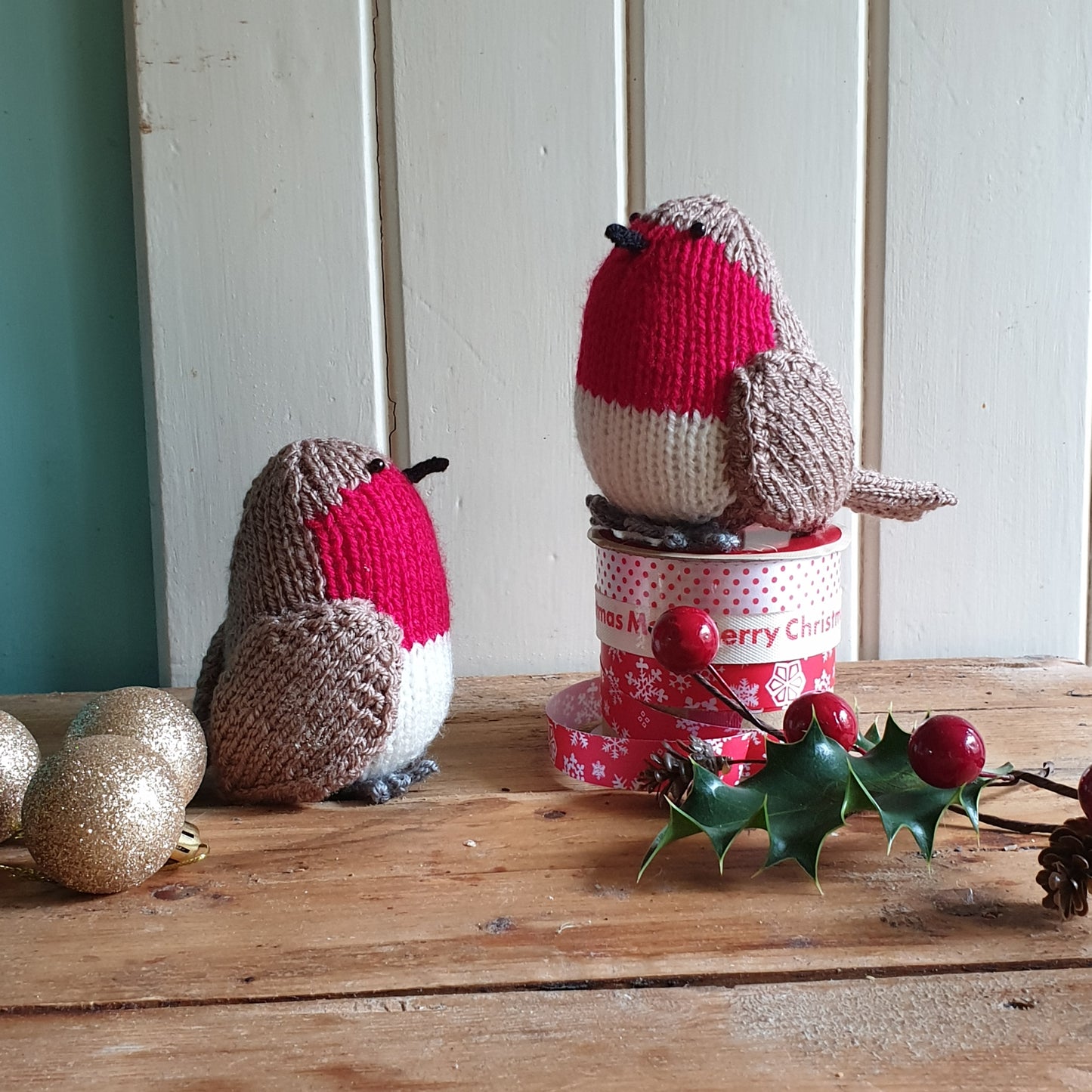Christmas knitted robin with holly and baubles