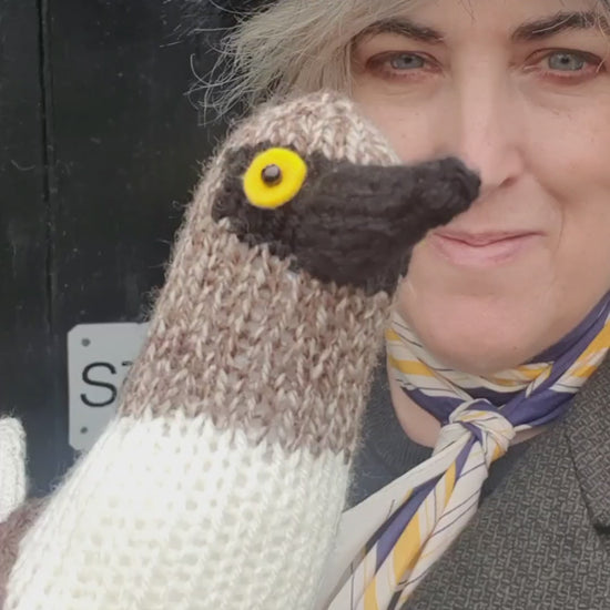 a knitted blue footed booby with knitting designer Nicky Stewart