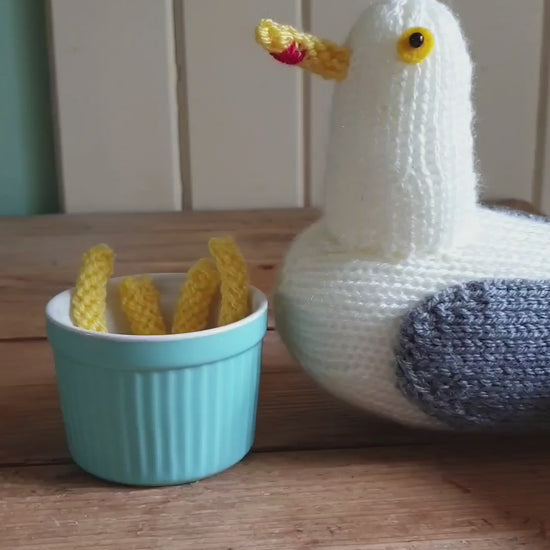 Big Jeff the knitted seagull eating knitted chips